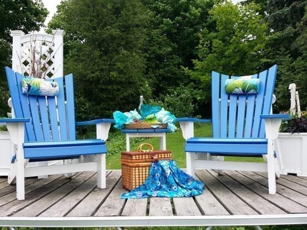 Two blue Krahn Yacht Club Chairs